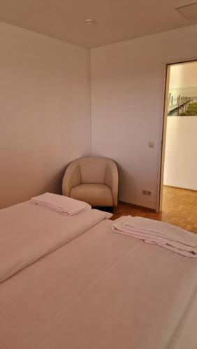 Ένα ή περισσότερα κρεβάτια σε δωμάτιο στο Pegasus Penthouse