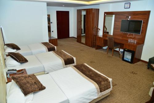 Televisyen dan/atau pusat hiburan di Dynasty Hotel