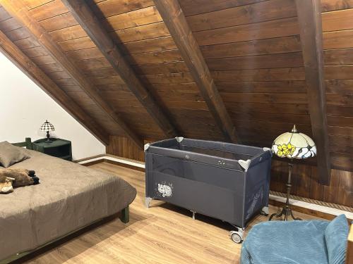 a bedroom with a bed and a dresser in a room at Zselici VadVirág Vendégház 