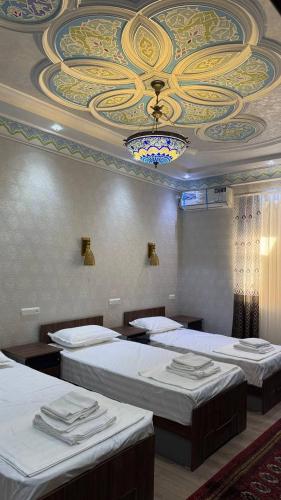 Кровать или кровати в номере Al Amin Hotel