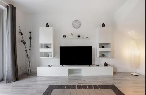 Televisyen dan/atau pusat hiburan di Ferienhaus Heide