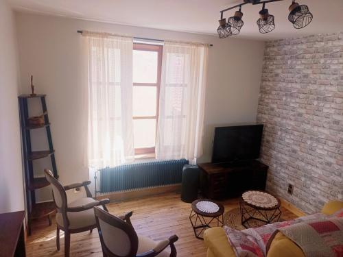 Posezení v ubytování La petite Maison