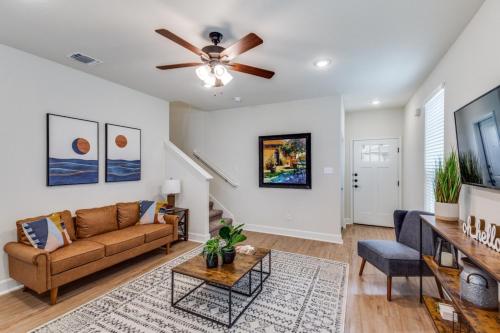 a living room with a couch and a ceiling fan at San Antonio Comfort 3 Beds, 2 Baths in Helotes