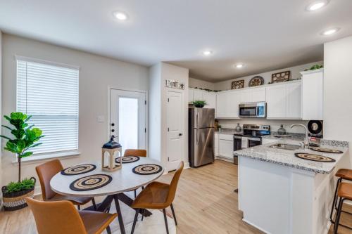 a kitchen and dining room with a table and chairs at San Antonio Comfort 3 Beds, 2 Baths in Helotes