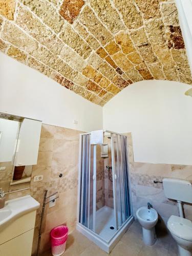 a bathroom with a shower and a toilet at Nonna Veronica in Gemini