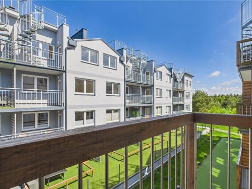 a view from the balcony of an apartment building at Apartament 44B, Dębina in Debina