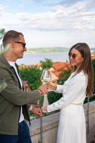 a man and a woman holding a trophy at Apartmán Milujto, Pálava in Pavlov