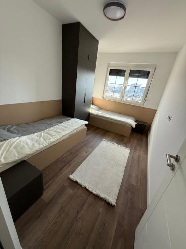 Katil atau katil-katil dalam bilik di Casa D Apartments