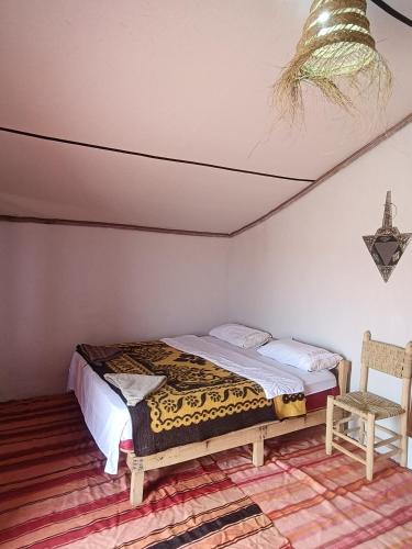 Ένα ή περισσότερα κρεβάτια σε δωμάτιο στο Camp Ayour Mhamid