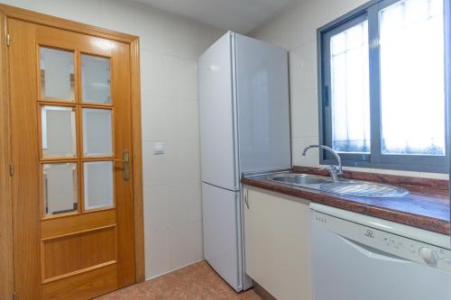 Flat with panoramic views, with garage and pool