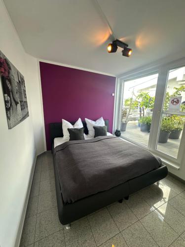 Ένα ή περισσότερα κρεβάτια σε δωμάτιο στο BookieB Apartment by Schmitt