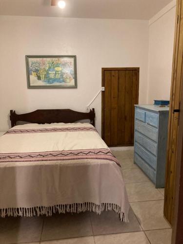 Katil atau katil-katil dalam bilik di Residencial Casa Amarela