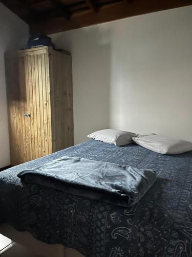 Katil atau katil-katil dalam bilik di Residencial Casa Amarela