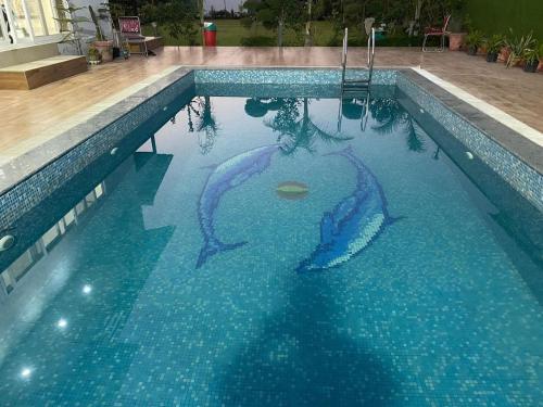 Πισίνα στο ή κοντά στο Vibe In Villa 3BHK