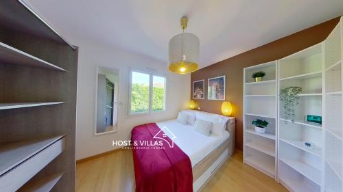 Postel nebo postele na pokoji v ubytování Host Villas LOUMÉA Saubion