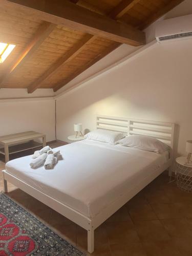 Ένα ή περισσότερα κρεβάτια σε δωμάτιο στο Narciso Katane suites