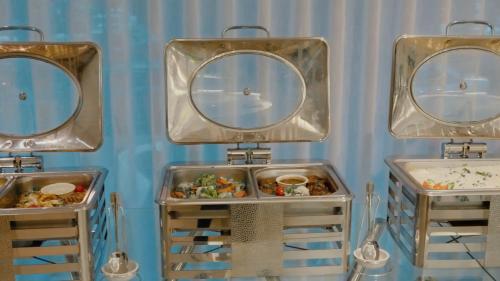 a group of three sinks with food in them at Casablanca Elite in Jeddah