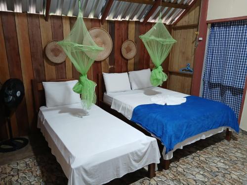 Ένα ή περισσότερα κρεβάτια σε δωμάτιο στο Trapiche Eco Lodge
