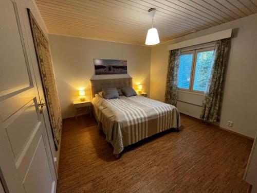Postel nebo postele na pokoji v ubytování Villa Toivo