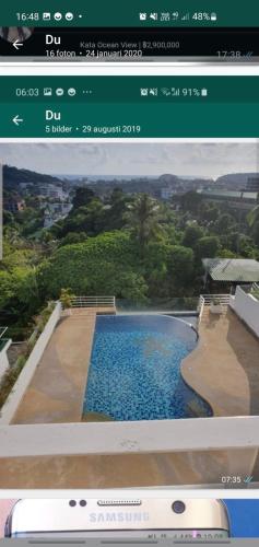 a computer screen showing a picture of a swimming pool at Christian Apartament in Kata Beach