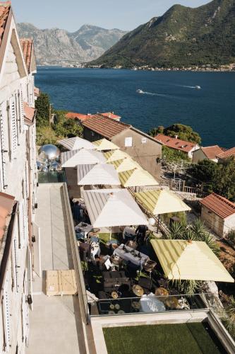 an overhead view of a building with umbrellas at Santa Boka in Perast