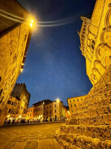 a view of a city street at night at Azienda agricola Panorama in Massa Marittima