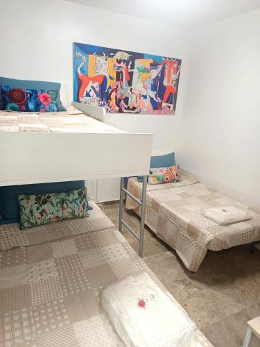 a room with two bunk beds and a table at RUIDERA HOLIDAY in Ruidera