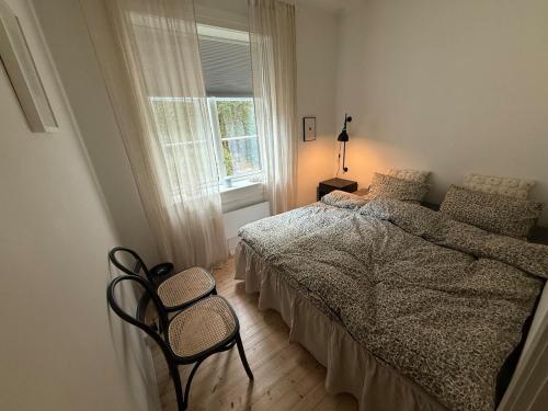 Giường trong phòng chung tại Apartment on Sankt Hanshaugen