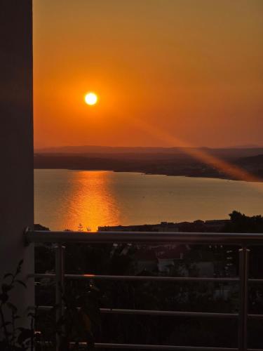 a sunset from the balcony of a house at La Marine Tabarka in Tabarka