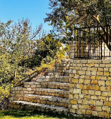 a brick wall with a gate on top of it at One Bedroom Chalet with private bathroom and kitchen in Alcobaça