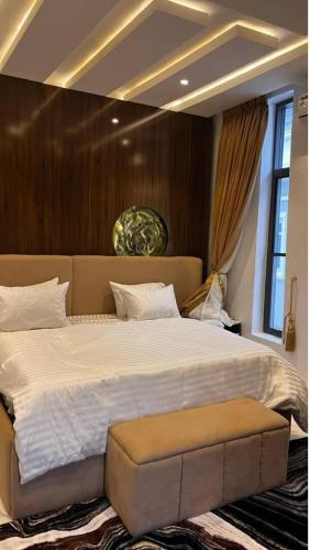 Ένα ή περισσότερα κρεβάτια σε δωμάτιο στο Alakim Residence and Suites