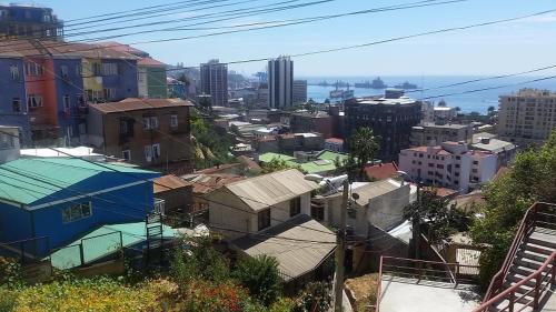 an overhead view of a city with buildings at La Casa Azul Hostel in Valparaíso