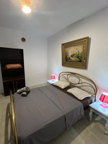 Giường trong phòng chung tại Oasis Blue