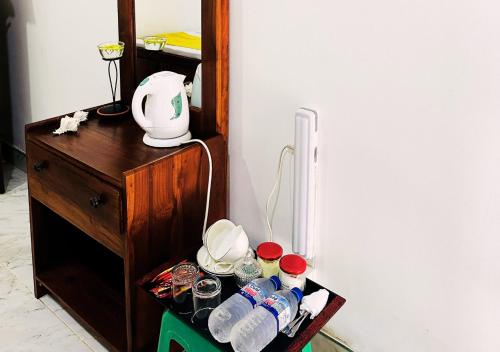 Sandakada Homestayにあるコーヒーまたはお茶