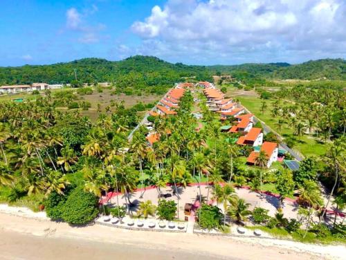 an aerial view of a resort on the beach at Praia dos Carneiros- Varanda Carneiros Club Meridional in Tamandaré