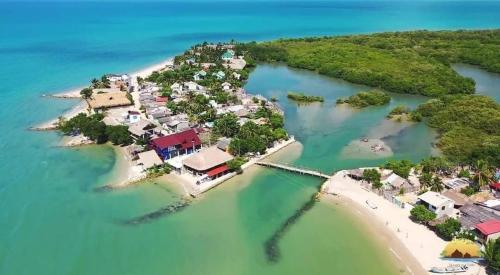 an aerial view of an island in the water at Taida Hostel Rincón del Mar in Rincón