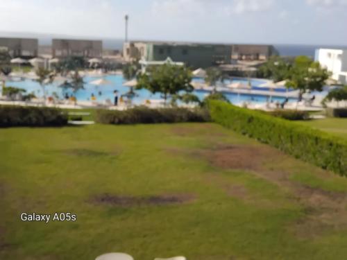 a view of the pool from the balcony of a resort at Fouka bay in Marsa Matruh