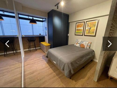 Ένα ή περισσότερα κρεβάτια σε δωμάτιο στο Studio Bsb 137