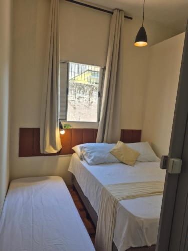 Ένα ή περισσότερα κρεβάτια σε δωμάτιο στο Casa Térrea 3 Dorm SP Expo Paralimpico