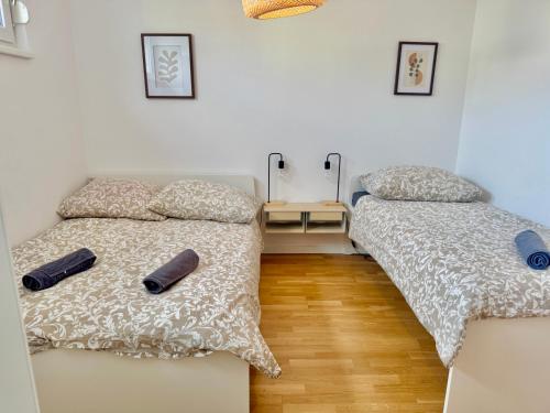 Katil atau katil-katil dalam bilik di WN Modern Apartments with Terrace Patio