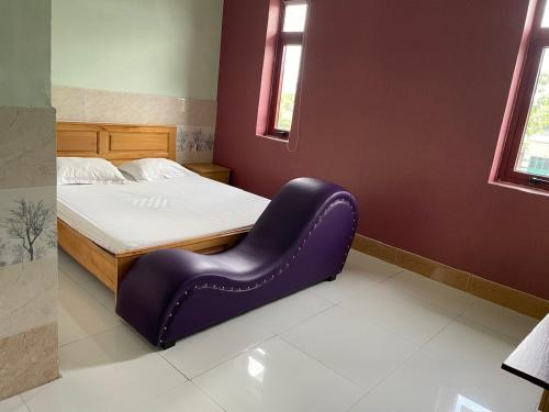Ένα ή περισσότερα κρεβάτια σε δωμάτιο στο Hotel Gia Bình