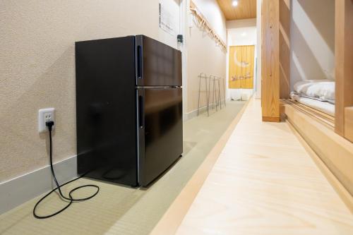 Postel nebo postele na pokoji v ubytování Comfy Stay Sarusawaike
