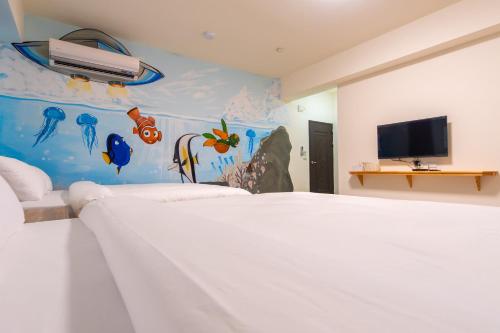 Homestay Hualienにあるテレビまたはエンターテインメントセンター
