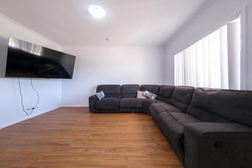 TV a/nebo společenská místnost v ubytování Stockmans Motel