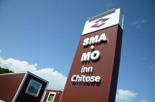 a building with a sign that says saa no im chinese at SMA MO inn Chitose in Chitose