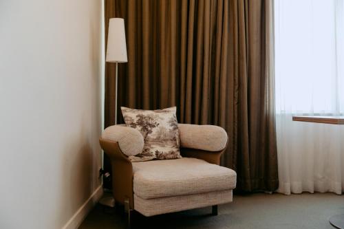 Posezení v ubytování Mercure Sydney Parramatta