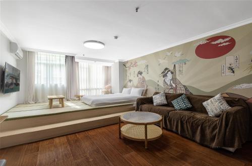 Ένα ή περισσότερα κρεβάτια σε δωμάτιο στο Vanhome Serviced Apartment 梵宿公寓