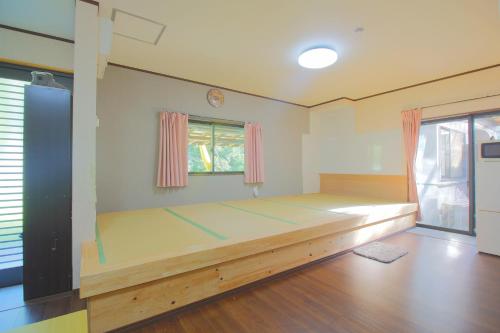 Cama o camas de una habitación en Minpaku MATSURI 民泊まつり