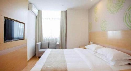 Katil atau katil-katil dalam bilik di GreenTree Inn Shanghai National Convention and Exhibition Center Huaxiang Road