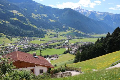 a view of a village in the mountains at DieAussicht - Refugium am Berg in Hippach